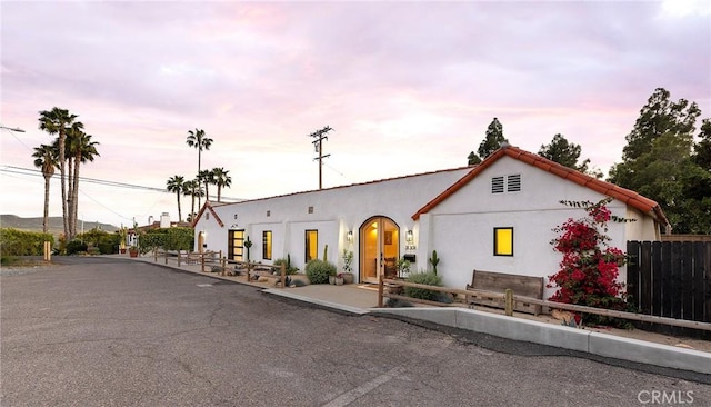 31303 Andres Pico Rd, San Juan Capistrano, CA 92675 - mediterranean / spanish-style house with stucco siding and fence