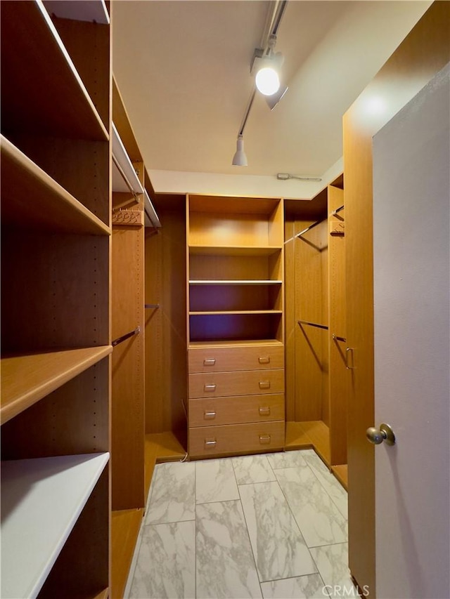 1310 E Ocean Blvd Unit 101, Long Beach, CA 90802 - walk in closet featuring light marble finish floors