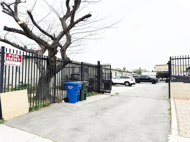 1330 S Reservoir St, Pomona, CA 91766 - uncovered parking lot featuring fence