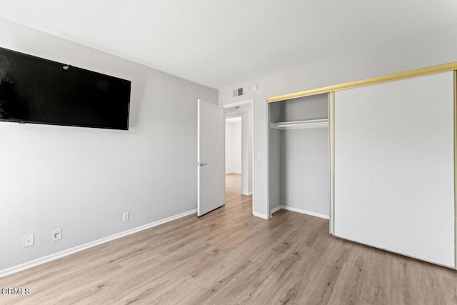 1805 Adelaide Ct, Oxnard, CA 93035 - unfurnished bedroom with wood finished floors, a closet, and baseboards