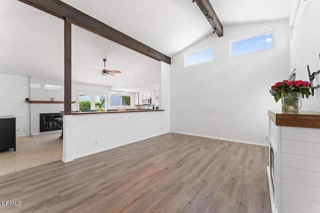 1805 Adelaide Ct, Oxnard, CA 93035 - unfurnished living room featuring light wood-style floors, a ceiling fan, and healthy amount of natural light