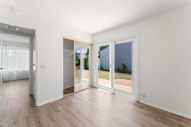 1805 Adelaide Ct, Oxnard, CA 93035 - spare room with wood finished floors, baseboards, and a smoke detector