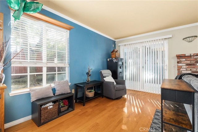 4524 Mananita Ave, Atascadero, CA 93422 - sitting room featuring healthy amount of natural light, wood finished floors, crown molding, and baseboards