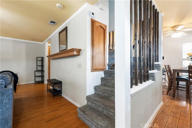 4524 Mananita Ave, Atascadero, CA 93422 - stairs featuring wood finished floors, crown molding, ceiling fan, and baseboards