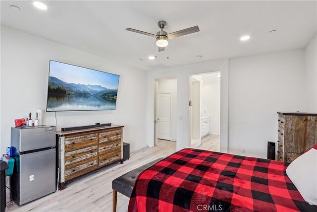 29167 Moraga St, Menifee, CA 92584 - bedroom with wood finished floors, recessed lighting, connected bathroom, and a ceiling fan