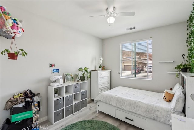 29167 Moraga St, Menifee, CA 92584 - bedroom featuring wood finished floors and a ceiling fan