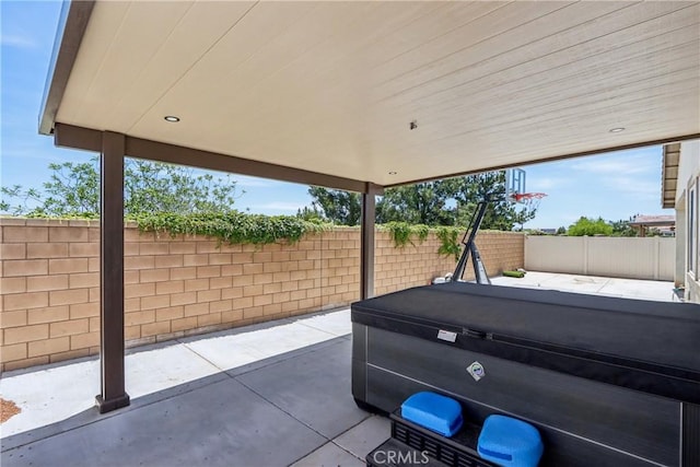 29167 Moraga St, Menifee, CA 92584 - fenced backyard featuring a patio and a hot tub