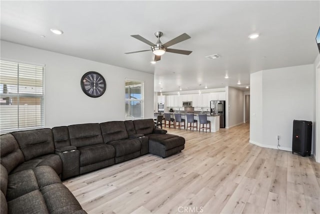 29167 Moraga St, Menifee, CA 92584 - living room featuring ceiling fan, light wood-type flooring, recessed lighting, and baseboards