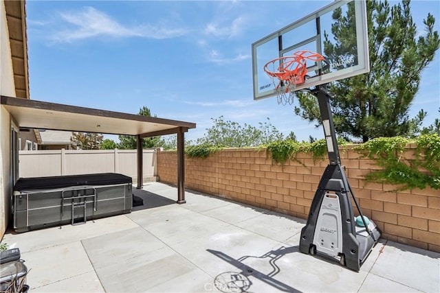 29167 Moraga St, Menifee, CA 92584 - fenced backyard with a hot tub and a patio area