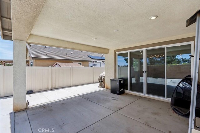 29167 Moraga St, Menifee, CA 92584 - fenced backyard with a patio