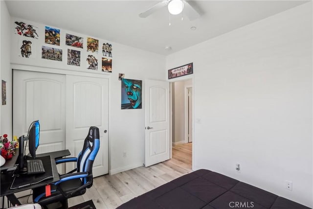 29167 Moraga St, Menifee, CA 92584 - office with light wood finished floors, a ceiling fan, and baseboards