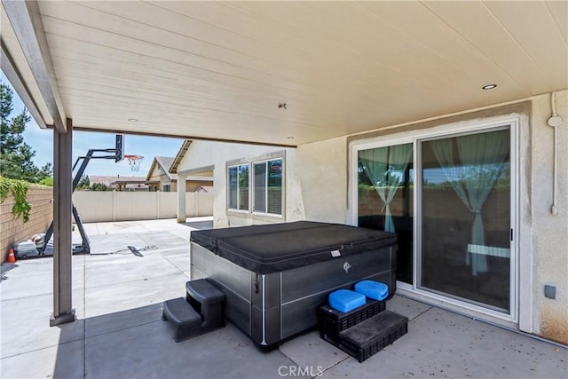 29167 Moraga St, Menifee, CA 92584 - fenced backyard featuring a hot tub and a patio area