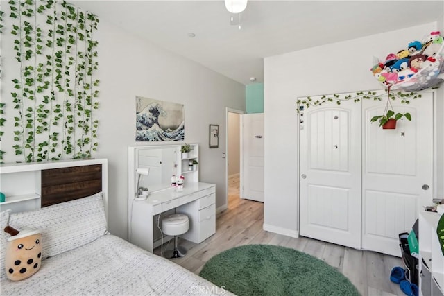 29167 Moraga St, Menifee, CA 92584 - bedroom with light wood-type flooring and baseboards
