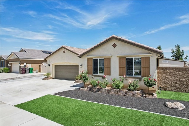 29167 Moraga St, Menifee, CA 92584 - view of front of house featuring stucco siding, concrete driveway, an attached garage, and a tile roof