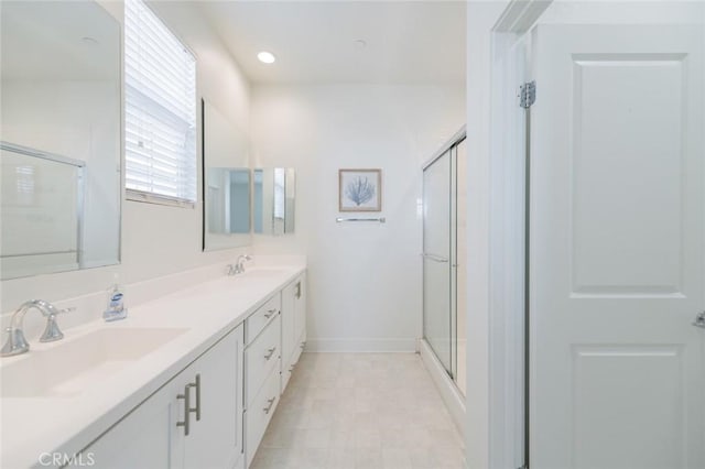 15926 Ellington Way, Chino Hills, CA 91709 - full bath featuring a shower stall, baseboards, and double vanity