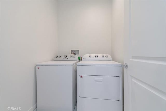 15926 Ellington Way, Chino Hills, CA 91709 - clothes washing area featuring washing machine and dryer