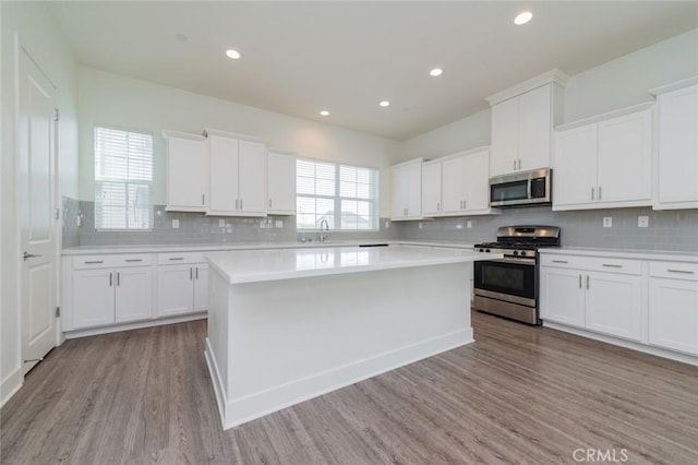 15926 Ellington Way, Chino Hills, CA 91709 - kitchen featuring appliances with stainless steel finishes, light wood-type flooring, light countertops, a sink, and recessed lighting