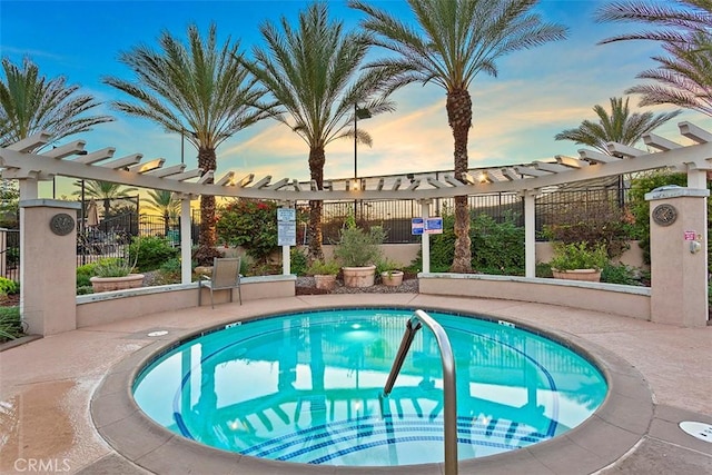 28046 Crystal Spring Dr, Menifee, CA 92584 - pool at dusk featuring fence, a pergola, and a pool