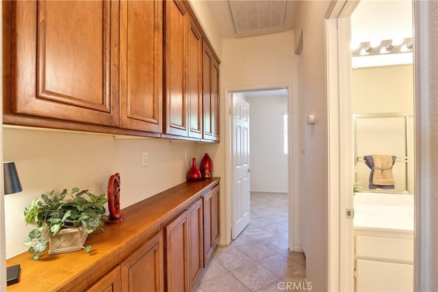 28046 Crystal Spring Dr, Menifee, CA 92584 - corridor featuring light tile patterned floors