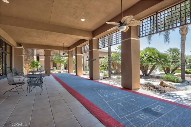 28046 Crystal Spring Dr, Menifee, CA 92584 - view of patio with a ceiling fan and shuffleboard
