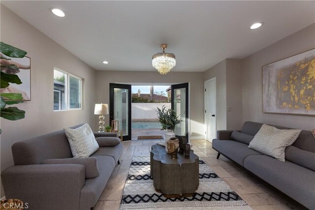 4325 N Country Club Ln, Long Beach, CA 90807 - living area featuring healthy amount of natural light, a chandelier, recessed lighting, and baseboards