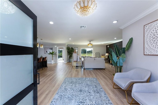 4325 N Country Club Ln, Long Beach, CA 90807 - living area featuring crown molding, recessed lighting, light wood finished floors, a chandelier, and baseboards