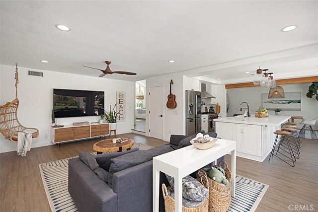 24132 Snipe Ln, Laguna Niguel, CA 92677 - living area featuring wood finished floors, recessed lighting, and a ceiling fan