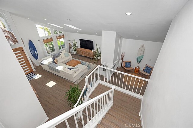24132 Snipe Ln, Laguna Niguel, CA 92677 - living room with wood finished floors, recessed lighting, and vaulted ceiling