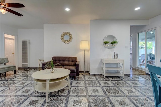 1419 S Hesperian St, Santa Ana, CA 92704 - living area featuring a heating unit, a ceiling fan, and recessed lighting