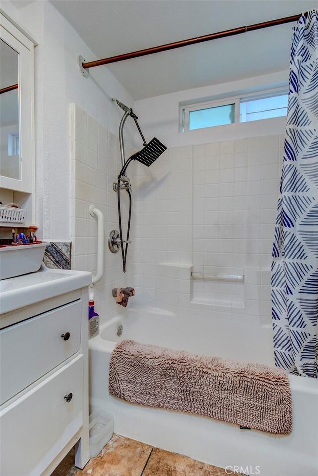 1419 S Hesperian St, Santa Ana, CA 92704 - bathroom featuring shower / tub combo with curtain, vanity, and tile patterned flooring