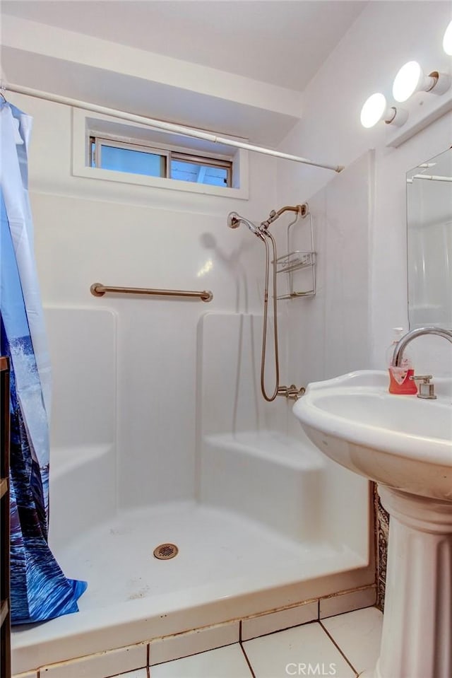 1419 S Hesperian St, Santa Ana, CA 92704 - bathroom with a stall shower and a sink