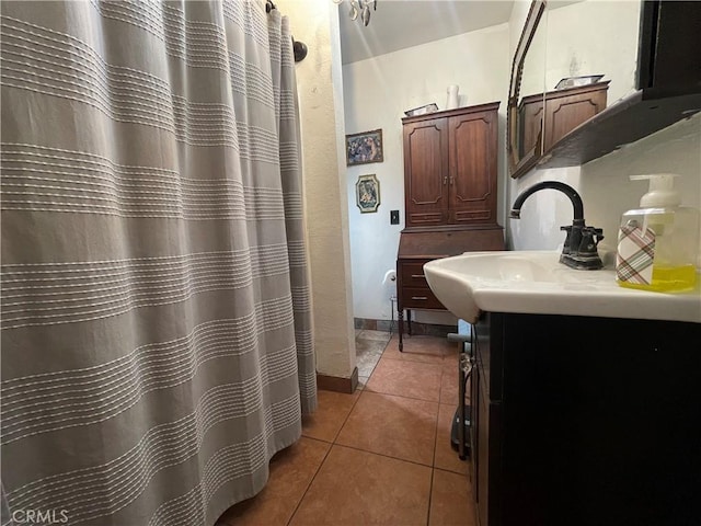 3641 E Elizabeth St, Compton, CA 90221 - full bathroom featuring vanity, tile patterned flooring, and curtained shower