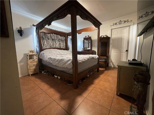 3641 E Elizabeth St, Compton, CA 90221 - bedroom with tile patterned floors and ornamental molding