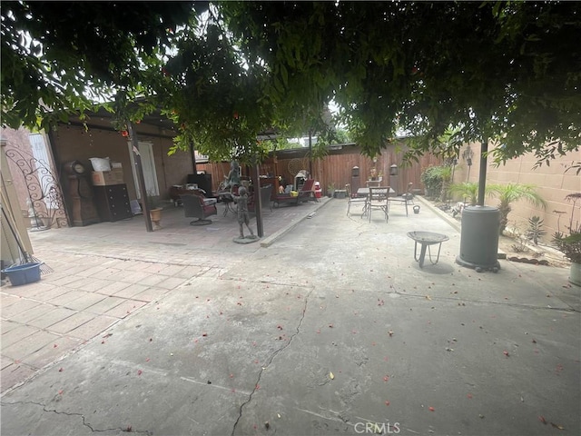 3641 E Elizabeth St, Compton, CA 90221 - fenced backyard with a patio and outdoor dining space