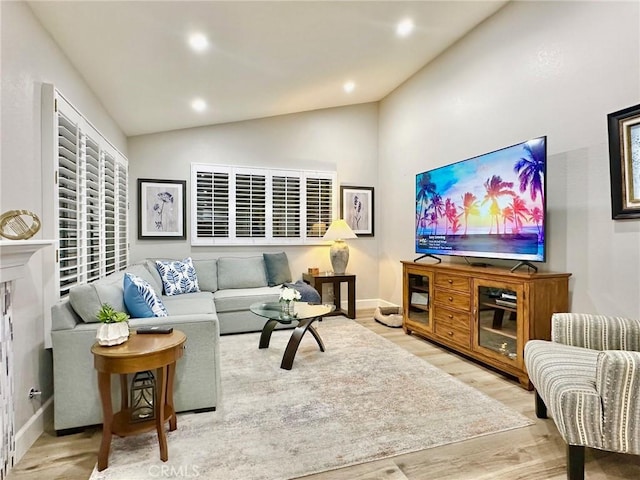 24082 Calendula, Mission Viejo, CA 92692 - living room with vaulted ceiling, wood finished floors, baseboards, and recessed lighting