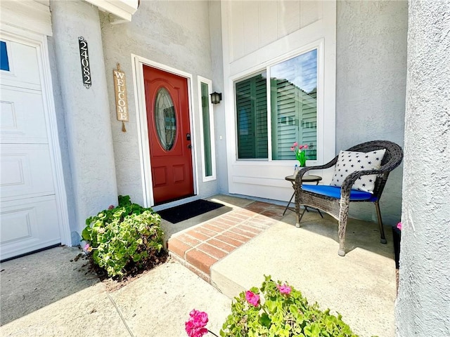 24082 Calendula, Mission Viejo, CA 92692 - doorway to property with stucco siding and a porch