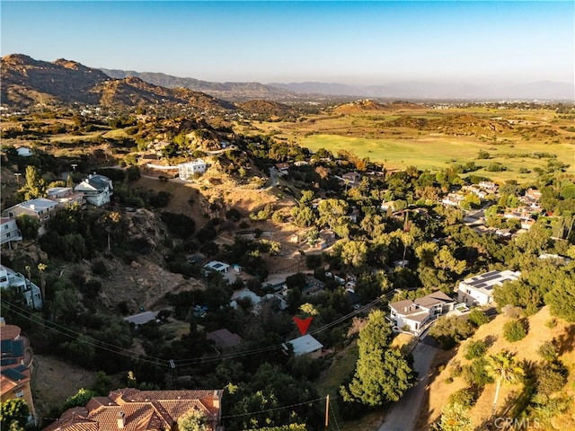 aerial overview of property's location with a mountain backdrop