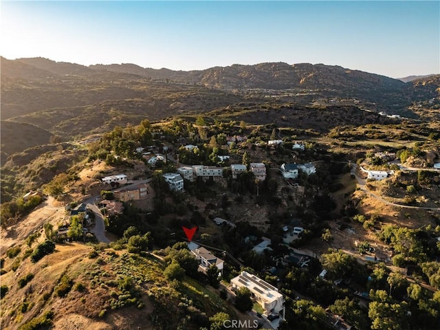 view of property location with a mountainous background