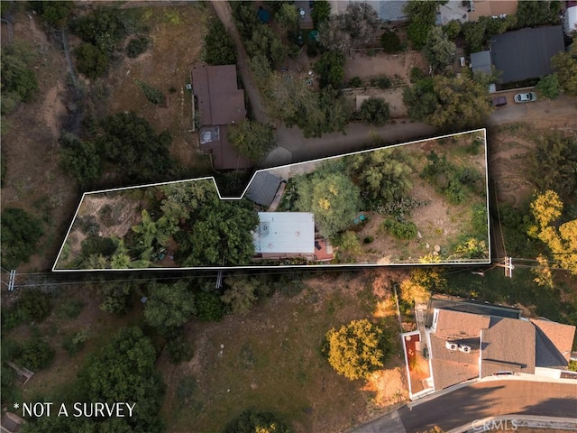aerial overview of property's location featuring property boundaries highlighted