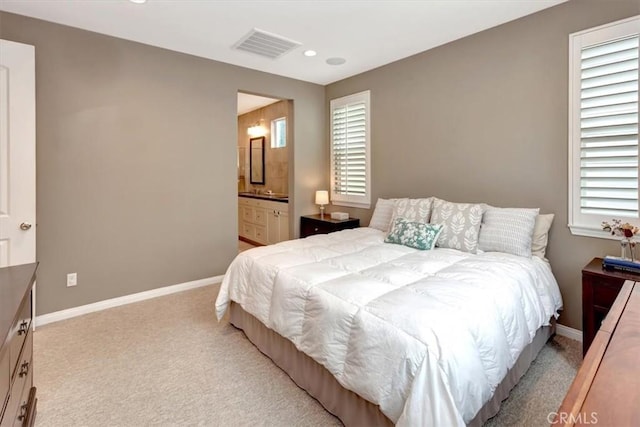 10561 Cannon Dr, Rancho Cucamonga, CA 91730 - bedroom featuring light carpet, baseboards, recessed lighting, and ensuite bath