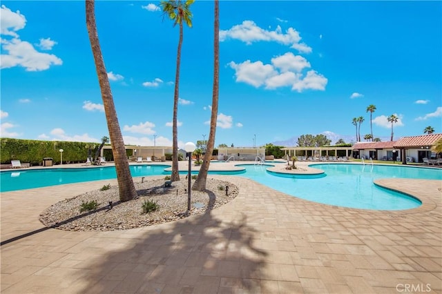 9653 Spyglass Ave Unit 99, Desert Hot Springs, CA 92240 - community pool featuring a patio