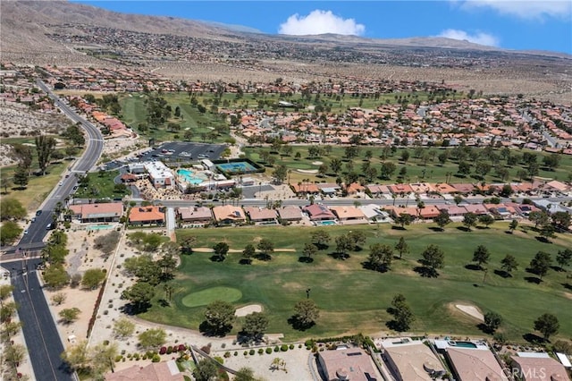 9653 Spyglass Ave Unit 99, Desert Hot Springs, CA 92240 - aerial overview of property's location featuring a mountainous background, a golf club, and nearby suburban area