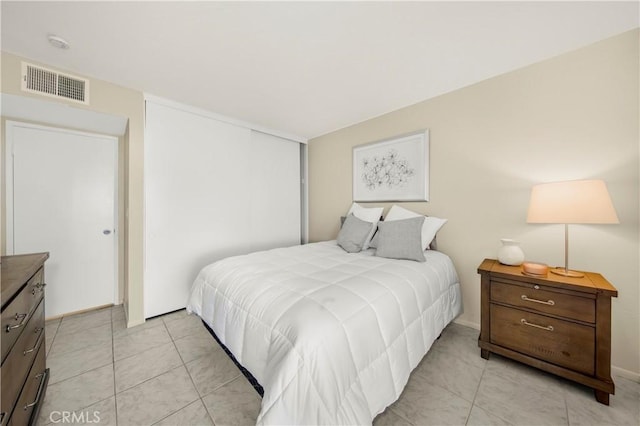 9653 Spyglass Ave Unit 99, Desert Hot Springs, CA 92240 - bedroom with light tile patterned flooring