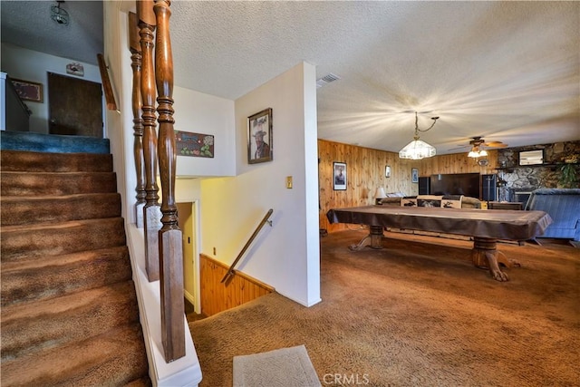 22972 Valley View Dr, Crestline, CA 92325 - game room featuring carpet, wood walls, billiards, ceiling fan, and a textured ceiling