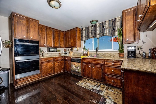 22972 Valley View Dr, Crestline, CA 92325 - kitchen with dishwasher, a sink, multiple ovens, dark wood finished floors, and light stone countertops