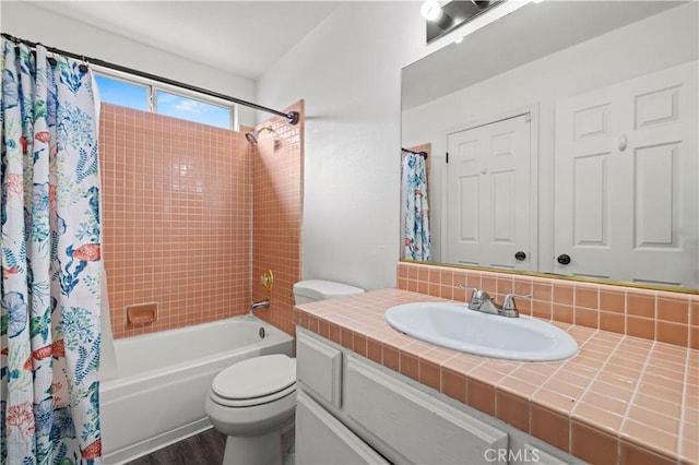 10213 Single Oak Dr, Bakersfield, CA 93311 - full bath with toilet, shower / bathtub combination with curtain, vanity, and wood finished floors