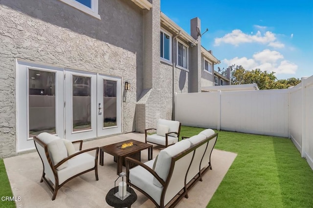 1314 Gina Dr, Oxnard, CA 93030 - fenced backyard featuring french doors, a patio area, and an outdoor living space with a fire pit
