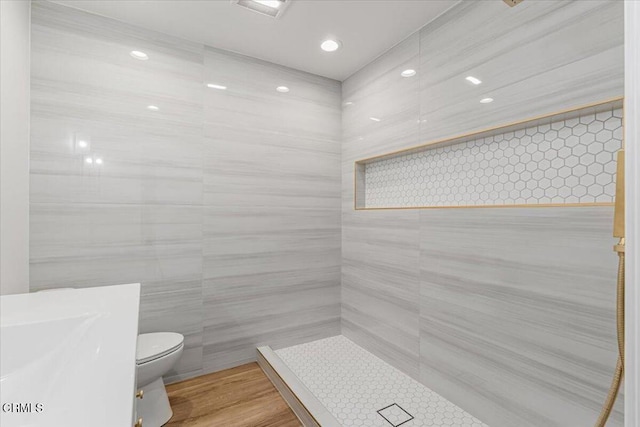 1314 Gina Dr, Oxnard, CA 93030 - full bathroom with tile walls, tiled shower, and recessed lighting