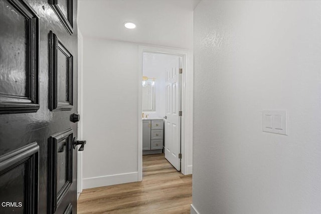 1314 Gina Dr, Oxnard, CA 93030 - corridor with light wood finished floors and recessed lighting