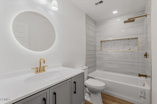 1314 Gina Dr, Oxnard, CA 93030 - full bath with vanity, shower / bathtub combination, wood finished floors, and recessed lighting